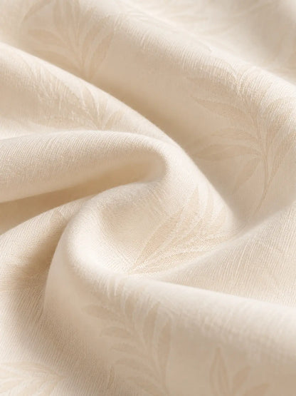Détail tissu ivoire – Pyjama chemisier homme Crème Élégant